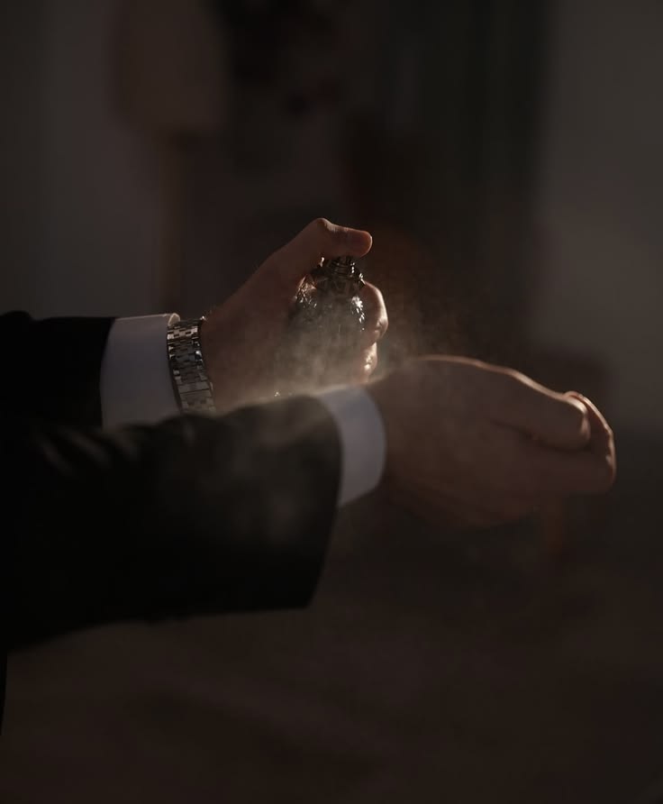 A discerning buyer applying a luxury fragrance
